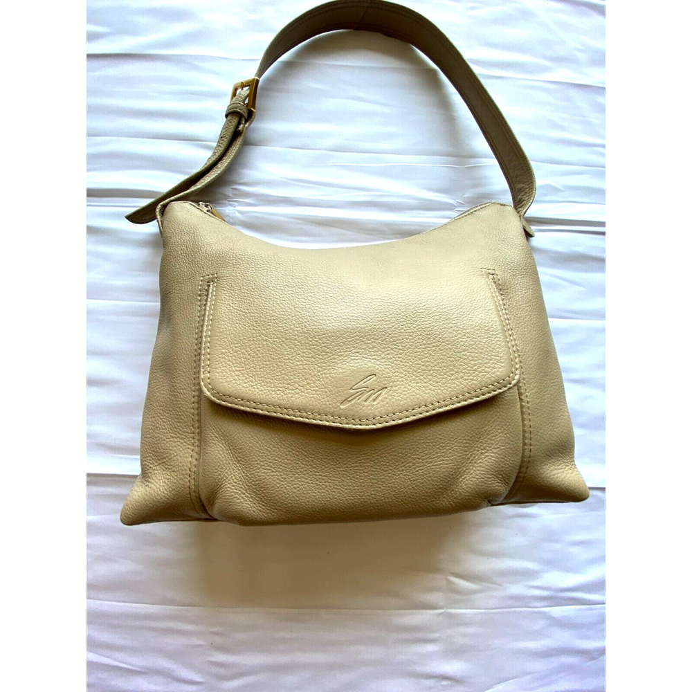 Stone Mountain Handbag Light Brown Leather with zipper pocket on the outside.EUC